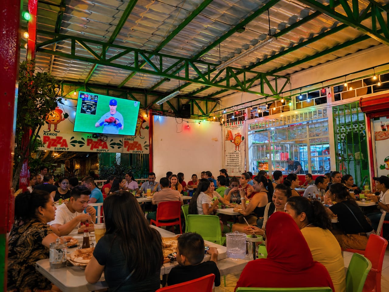 Espacio de entretenimiento y amigos en Kero's Pizza